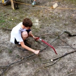 Logan%2520sawing%2520his%2520way%2520thru
