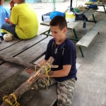 Steven%2520making%2520a%2520square%2520lash%2520for%2520the%2520troop%2520sign